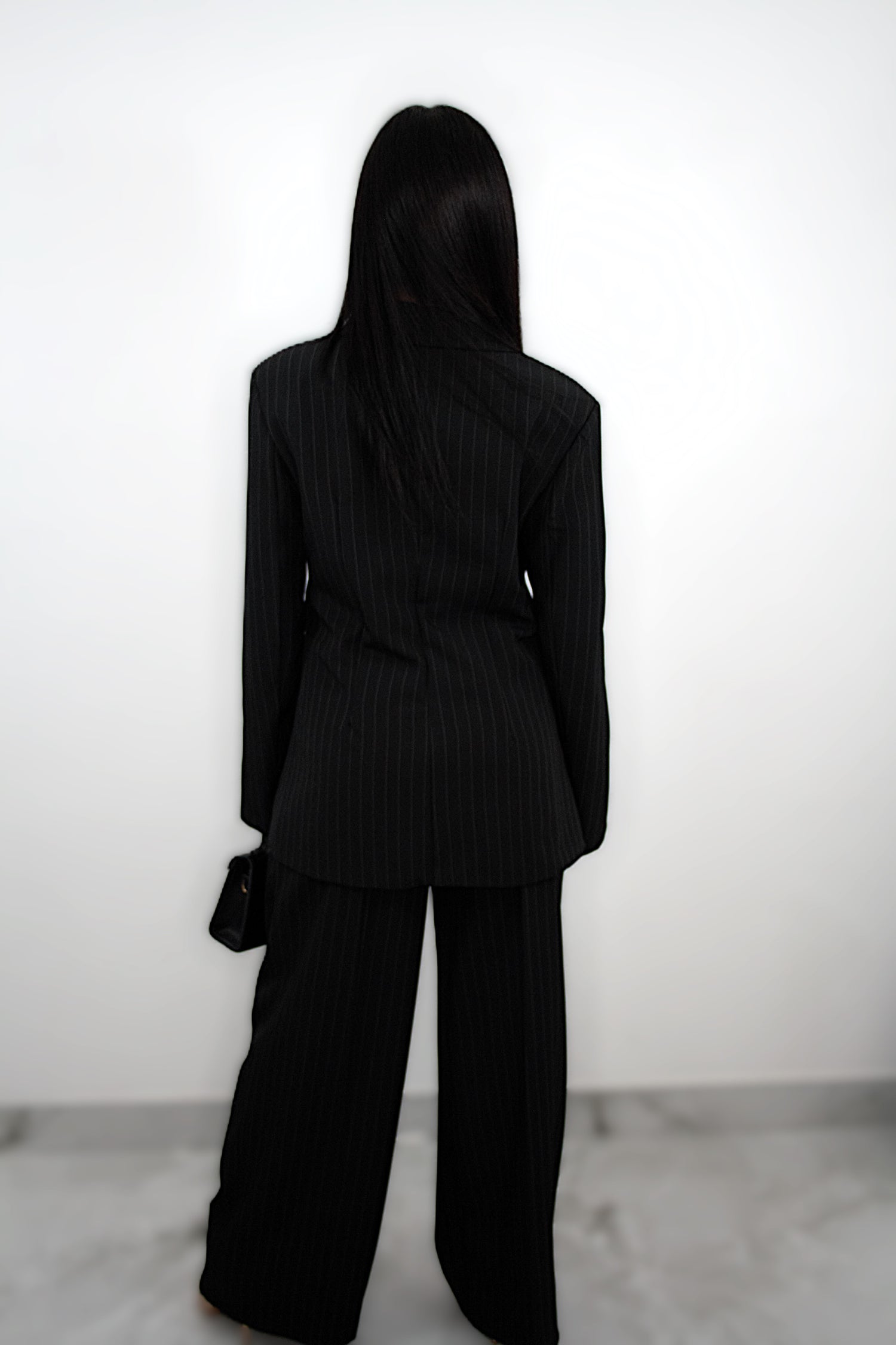 Tailleur “Brigitte” nero gessato