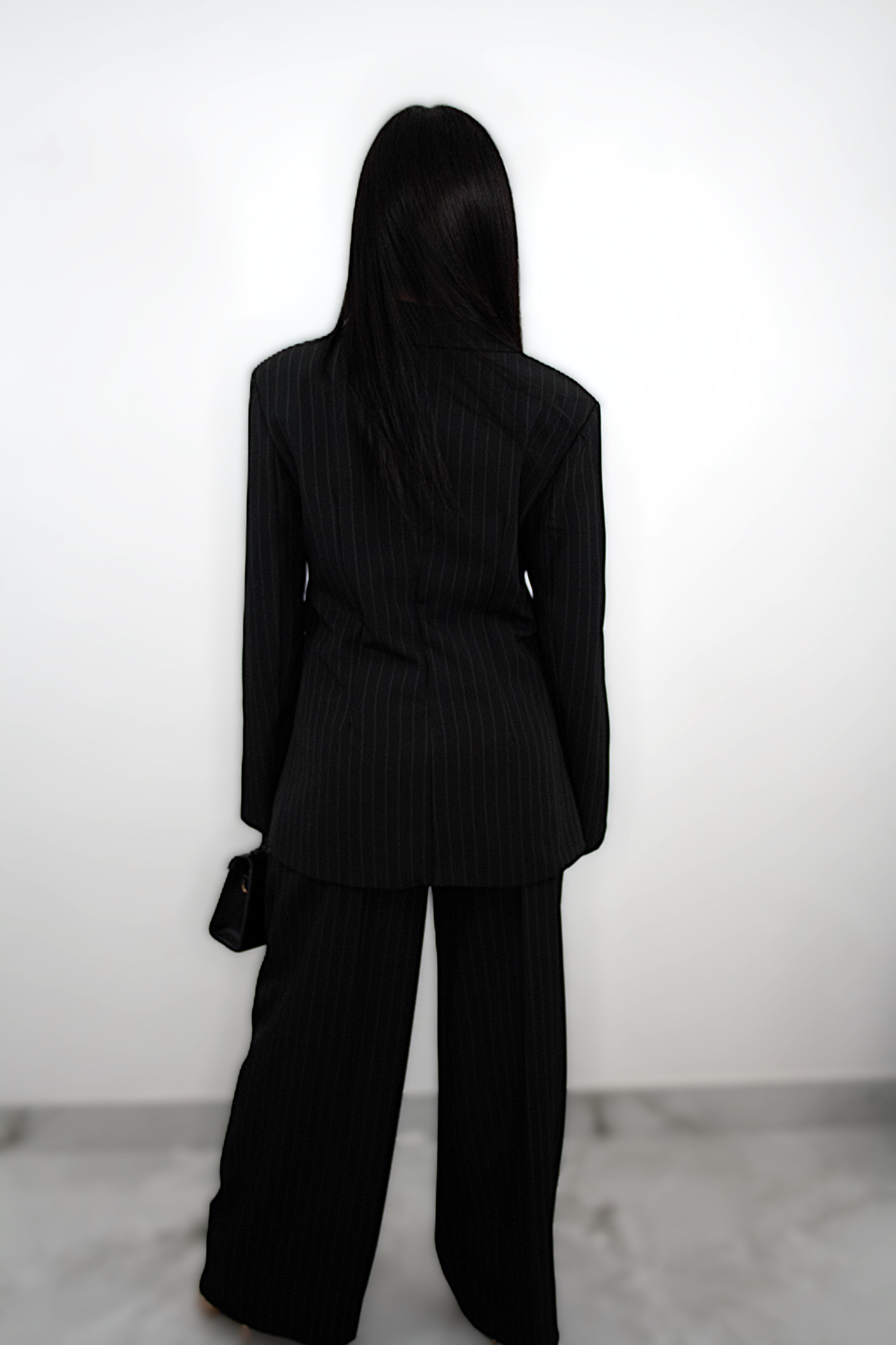 Tailleur “Brigitte” nero gessato