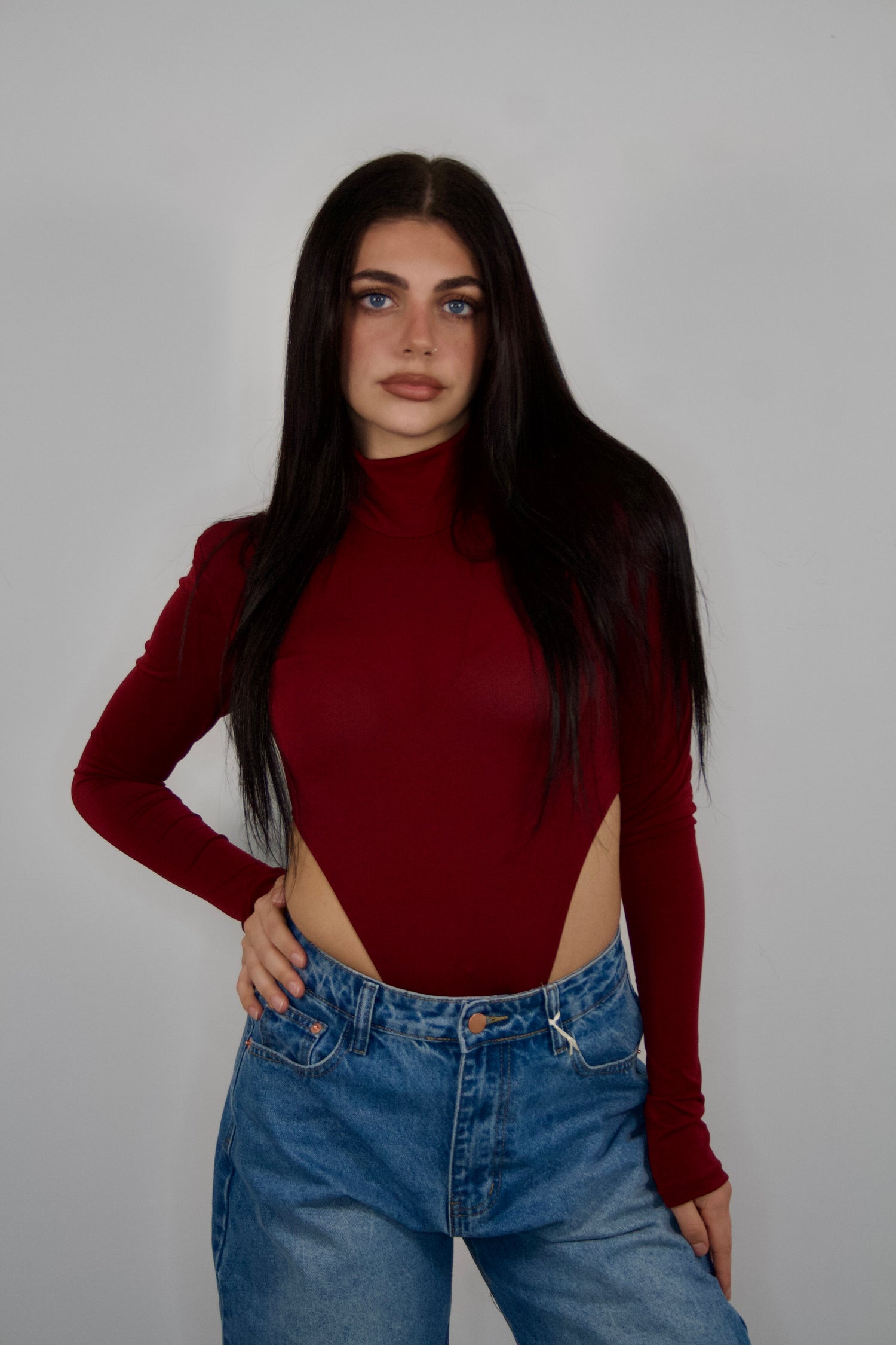 Body sgambato con collo dolcevita