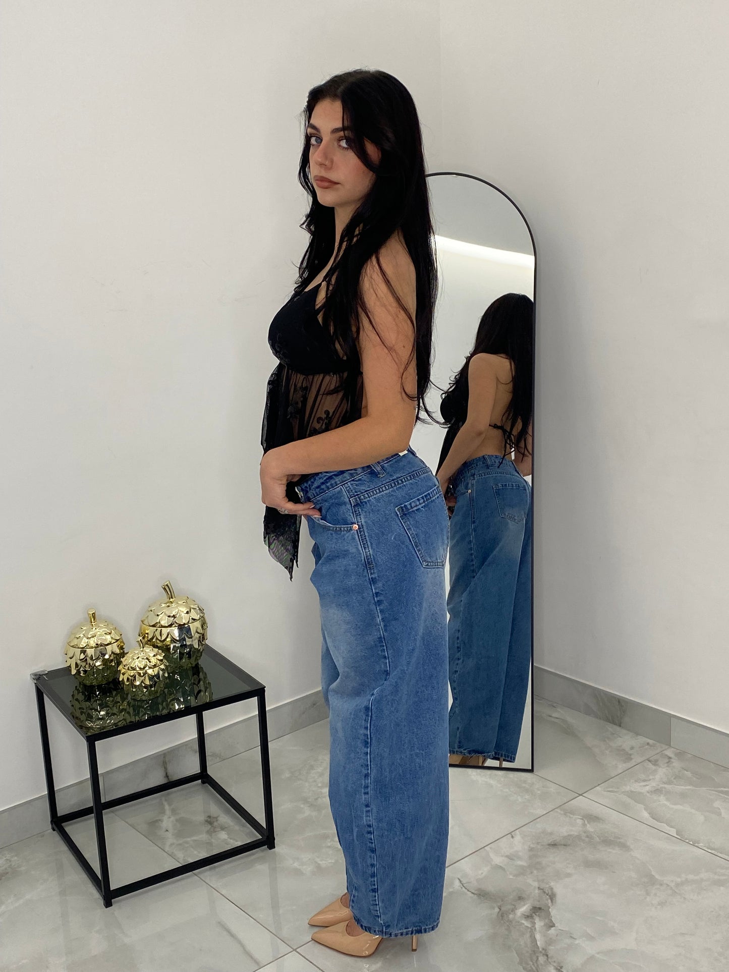Top nero con dettagli in paillettes