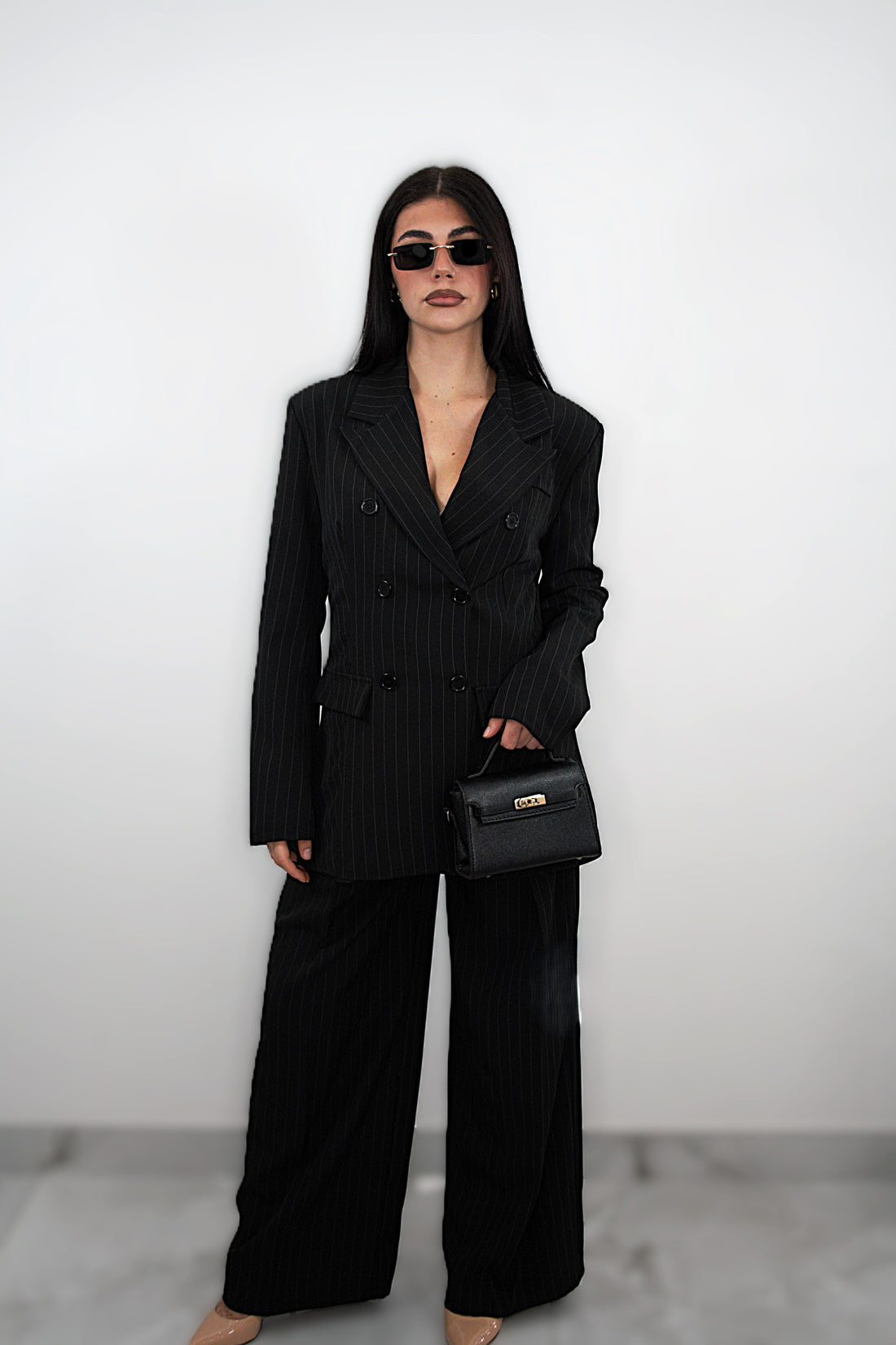 Tailleur “Brigitte” nero gessato